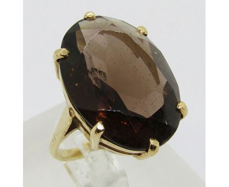 9ct oval claw set smoky quartz dress ring, maker 'S&amp;Co', Birmingham 1979, size K, 8.9g