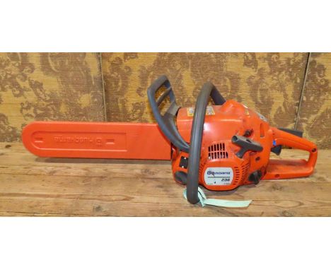 A Husqvarna 236 petrol driven chainsaw 