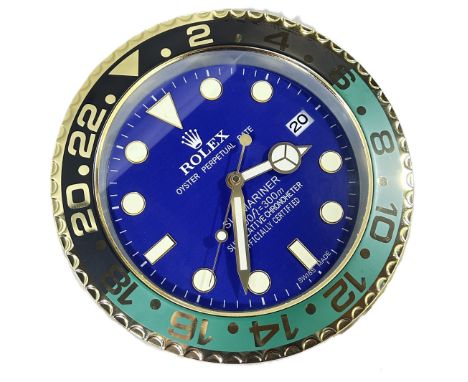 A contemporary decorative ‘Rolex dealer display’ wall clock, marked Submariner Oyster Perpetual Date’, with blue 10” dial, gr