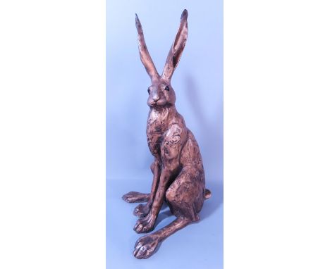 A Paul Jenkins bronze effect sculpture of a seated hare, initialled 'PJ' near tail, 47cm tall.