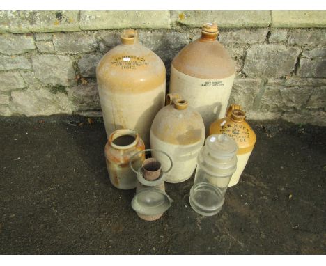 A large vintage stoneware flagon with printed merchants mark for H B Skeates &amp; Co, wine &amp; spirit merchants, Little Ki