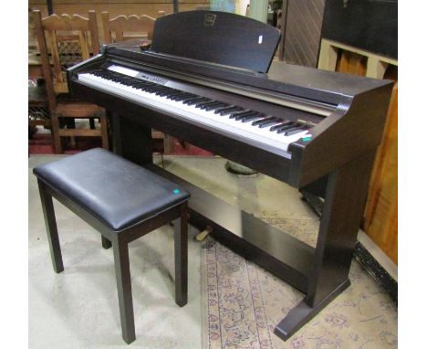 A Yamaha Clavinova electric piano and matching stool 