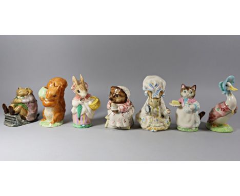 A collection of 15 Royal Albert Beatrix Potter figures, a nursery plate and mug