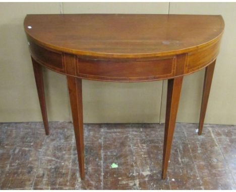 A Georgian demi-lune card table on square tapered legs, 97cm diameter