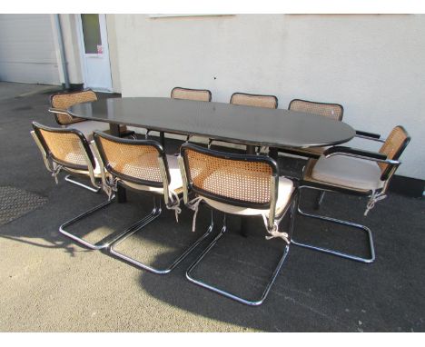 Eight dining chairs (6+2) designed by Marcel Breuer for Thonet of cantilever form with cane panels, together with a 20th cent