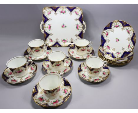 A Jackson &amp; Gosling part tea set with floral detail, together with a collection of Goss Crested ceramics, mainly vessels