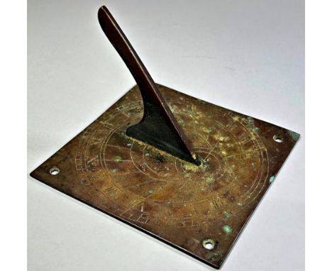 A small weathered bronze sundial, 11cm square