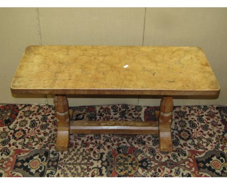 Workshop of Robert ‘Mouseman’ Thompson of Kilbern, a rectangular coffee table with adzed top, 91cm long x 35cm wide x 46cm hi