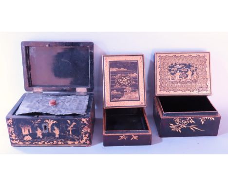 A 19th century black and lacquered caddy with metal lining and two further lacquered  boxes (3) 