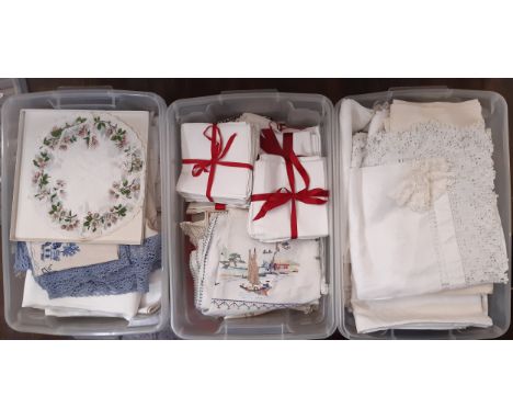 3 boxfuls of good quality household linen including damask and embroidered table cloths, bundles of white napkins, decorative