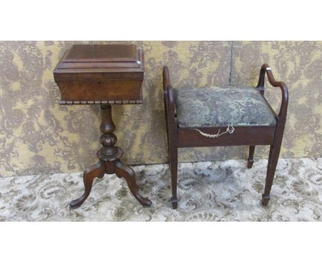 A 19th century walnut sarcophagus shaped teapoy/sewing table raised on a central turned pillar and shaped tripod, 74 cm high 