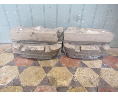 A pair of architectural facing stones with coronet detail, 21 cm high x 36 cm  x 20 cm approximately