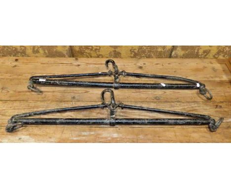 A pair of vintage painted iron hanging brackets 