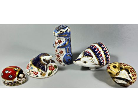 A collection of four Royal Crown Derby characters to include a Hedgehog, silver stopper, a Ladybird, gold stopper, a Mole, si