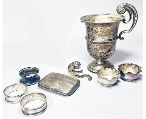 A mixed selection of silver including a case Christening spoon, a cased condiment set, case teaspoons, loose teaspoons, a sil