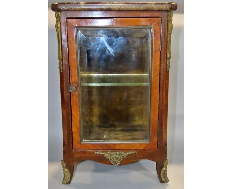 A miniature Louise XIV king’s wood Vitrine with a marble plinth top and ormolu mounts, velvet lined interior raised on cabrio