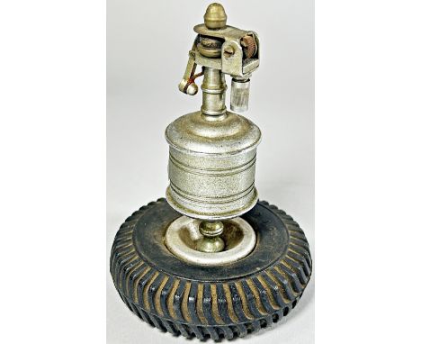 A scarce Anglia Mechero for Dunlop vintage table lighter with Dunlop tyre base, 10cm high.