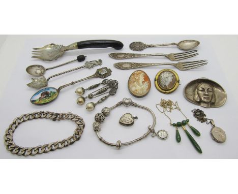 Mixed silver jewellery to include a Pandora charm bracelet with five charms, an unusual cast brooch in the form of a lady wea