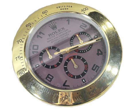 A contemporary decorative ‘Rolex dealer display’ wall clock, marked ‘Daytona Oyster Perpetual Superlative Chronometer Cosmogr