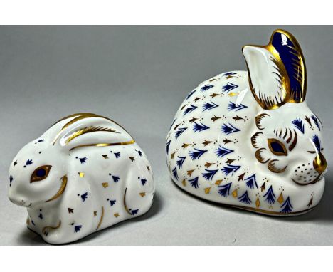 A Royal Crown Derby Imari Hare with gold stopper and two Rabbits, one gold, one silver stopper