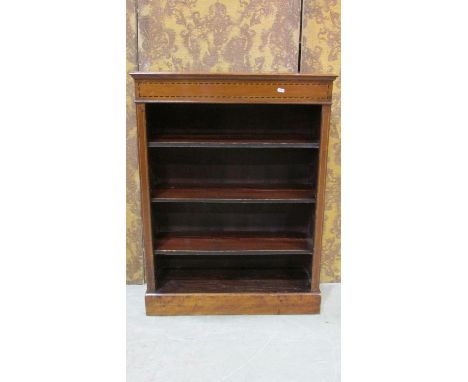 An Edwardian mahogany dwarf floor standing open bookcase with chequered banding, three adjustable shelves and moulded plinth,