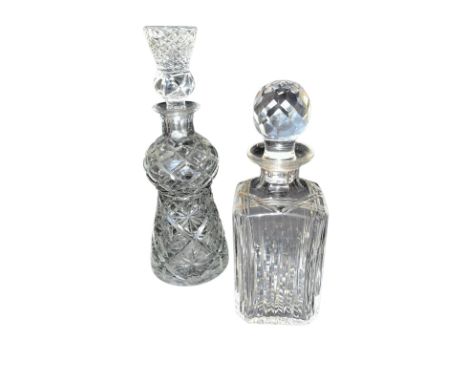 A good quality tapering clear cut glass decanter with thistle head stopper, 31cm high, &nbsp;together with another squared de