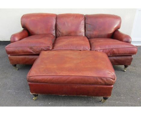 A good quality contemporary tan leather upholstered sofa in the Howard style with loose seat cushions, 80 cm high x 202 cm lo