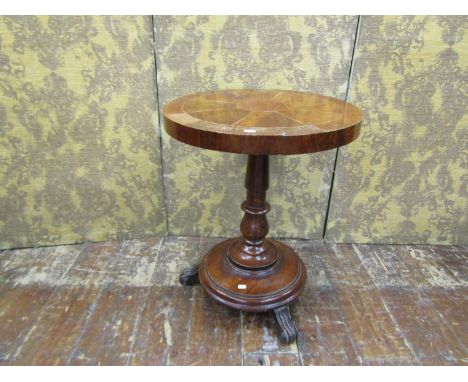 A 19th century walnut occasional table the circular top with segmented veneers on turned pillar and platform base, 55cm diame