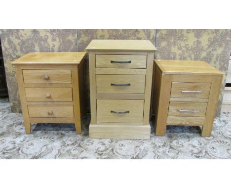Three contemporary light oak bedside chests of varying design, two three drawer and a further two drawer example