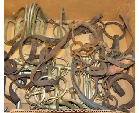 Equestrian interest - a box of horse bits/stirrups, saddle rack etc