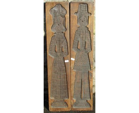 Two vintage wooden gingerbread moulds of women 75cm tall. 