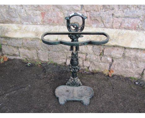 A cast iron umbrella/stick stand with foliate detail 62 cm high x 37 cm wide 