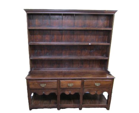 Georgian cottage pot board dresser fitted with three drawers with open shelves below supporting a Delft rack of three graduat