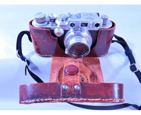 Photography Interest - A Leica Model IIIA camera, model number 254439 - 1937 in leather case