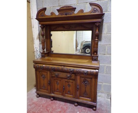 Late Victorian/Edwardian oak mirror back sideboard with raised mirror back over an arrangement of cupboards and drawers with 