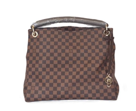 Large handbag similar to the style of a Louis Vuitton Artsy bag, featuring a single handle with  braided detail (still in pac