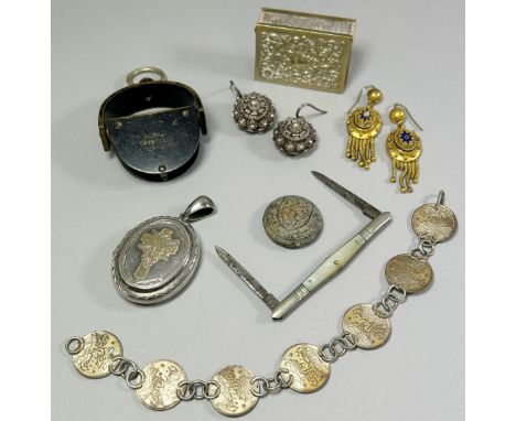 A collection of miscellaneous items to include a military prism, within an arched frame, J. H. Selward Ltd 406 Strand, London