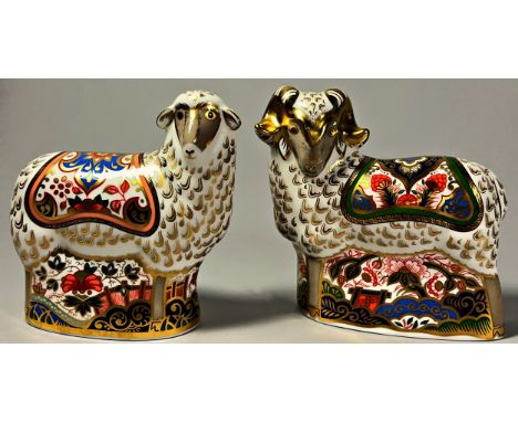 A collection of Royal Crown Derby Imari sheep comprising a Ram and Ewe in standing pose with gold stoppers and two further in