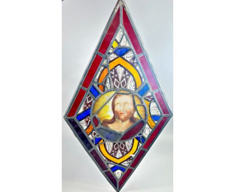 A 19th century shaped lead stained glass panel 66cm w x 56cm h, together with a diamond shaped lead stained glass panel, with