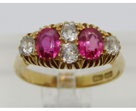 Antique 18ct ruby and diamond ring, the diamonds 0.15ct each approx, maker 'HPH', size P, 5.1g