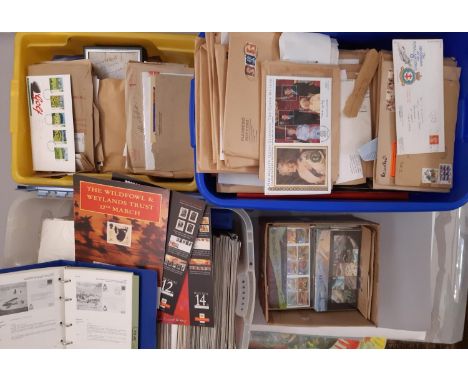 A very large lot in 3 large plastic crates and a box. Large quantity of GB Post Office commemorative stamp advertisements and