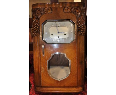 A mixed collection of antique and vintage continental clocks to include walnut wall clocks, others in the Art Deco style to i