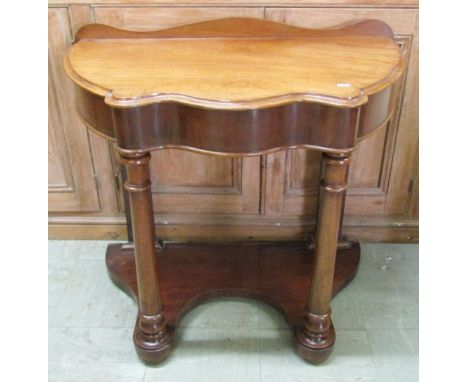 A small Victorian console table together with an Edwardian mahogany octagonal two tier occasional table (2) 