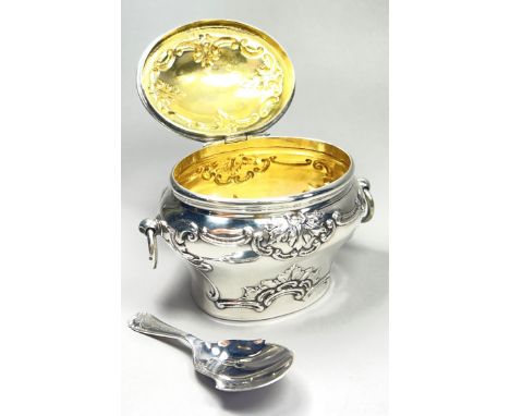 A late Victorian silver tea caddy with hinged lid and acorn finial and ring handles, London, 1900, maker mark rubbed, togethe