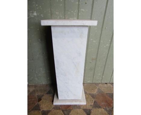 A white marble and grey flecked pedestal with rectangular top, column and platform base, 67 cm high x 29 cm x 23 cm