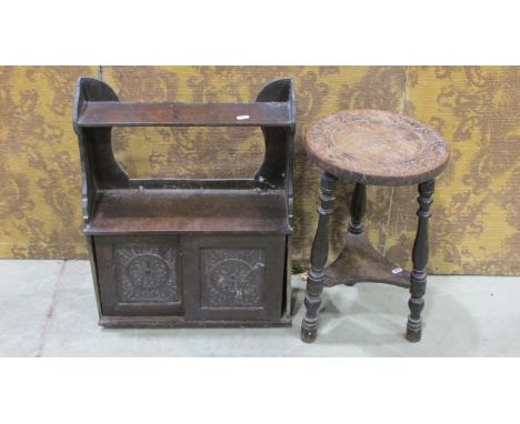 A small Victorian oak wall cupboard enclosed by a pair of sliding carved foliate panelled doors 57 cm high x 45 cm wide x 17 