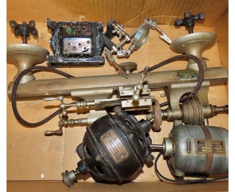 A vintage clock makers lathe with applied label G Matheys Brussels, together with three associated motors, etc