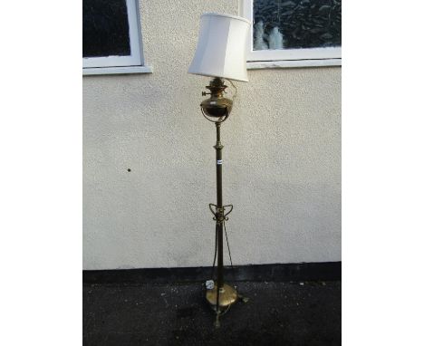 A late 19th century brass telescopic oil lamp standard 