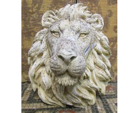 A cast composition stone lions mask wall plaque, 41cm x 34cm