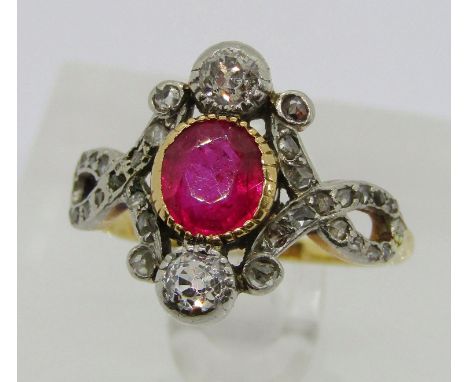 19th century 18ct bezel set ruby and diamond ring, the oval ruby flanked by a pair of diamonds 0.15ct each approx, with furth